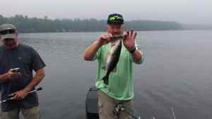 Ed with his possum lure. Cobosee, ME