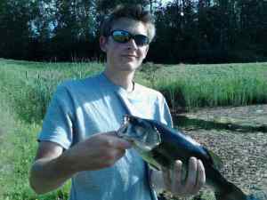 largemouth with a frog