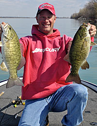 Jerry Gostenik with a pair of trophy smallies. Even in the most northern climes the bass season lasts a lot longer than most people think.