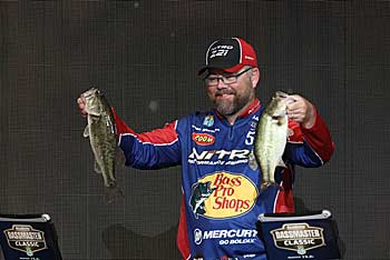 Bass aren’t found everywhere along a bluff, says tournament veteran Brian Snowden. So, he concentrates his casts at small ledges, which are at varying depths, points, and rock slides. Photo courtesy of B.A.S.S. / Gary Tramontina