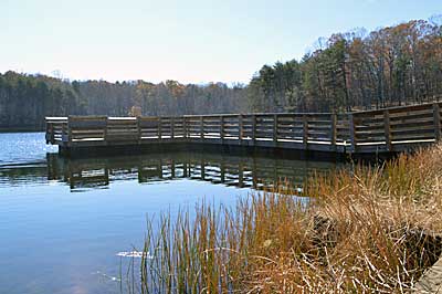 Fishing piers offer access to slightly deeper water and create shoreline cover. Fish them during off-hours to beat the pressure from the other anglers that they attract. Photo by Pete M. Anderson