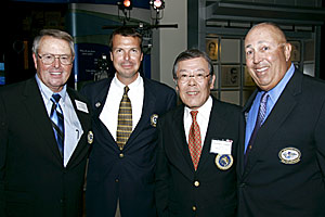 Commemorating the latest class of inductees into the IGFA Fishing Hall of Fame are from left to right newest member Bill Dance, IGFA President Rob Kramer, Yasumoto Innami, the Vice President of the Japan Game Fish Association representing the late Hidenori Onishi who was enshrined, and hall of fame member Mark Sosin