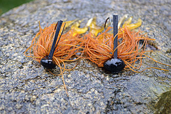 You can fish any style of jig deep, but heads that have more forward weight, such as Arkie, left, and football, make the job easier. Photo by Pete M. Anderson