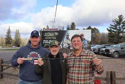 Purple Heart Recipient and Wounded Warriors in Action Volunteer Andy Hendrickson (L), Wounded Warriors in Action Foundation founder Lieutenant Colonel (Ret.) John J. McDaniel (C), and St. Croix Vice President of Marketing Jesse Simpkins (R) show one of 1,000 limited-edition Premier rods that will be sold at stcroixrods.com starting this Saturday to raise $40,000 each for Wounded Warriors in Action and Take a Vet Fishing. These two premier veteran's advocacy groups use the camaraderie and healing power of fi