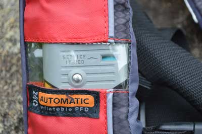 If you wear an inflatable PFD, ensure it's charged and ready to deploy. Don’t hesitate to replace cartridges whose indicators aren’t green. Photo by Pete M. Anderson