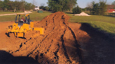 Removing silt and repairing shoreline erosion.