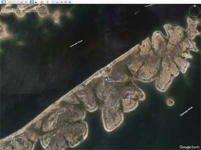 The aptly named "Sometimes Island" can be seen here during low water years and will be underwater during higher water levels. Google Earth Pro shows this island at varying stages depending on when the satellite image was taken.