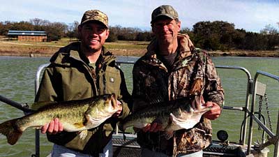 These two big female bass were stage with a 2.5 pound male bass near a nest site.