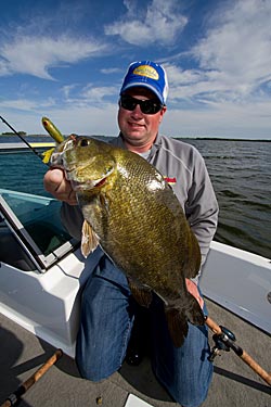 The author, Jason Mitchell with a huge smallmouth bass. The reservoirs on the Missouri River in both North and South Dakota offer tremendous opportunities for smallmouth bass.