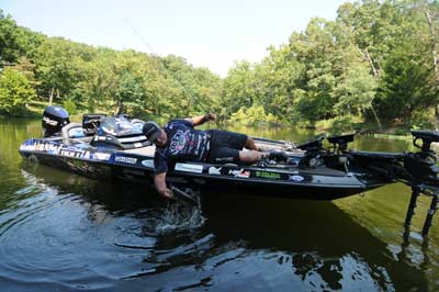 The summertime action can be as hot as the weather for Jeff Hoots when he finds shallow bass in the backs of coves.