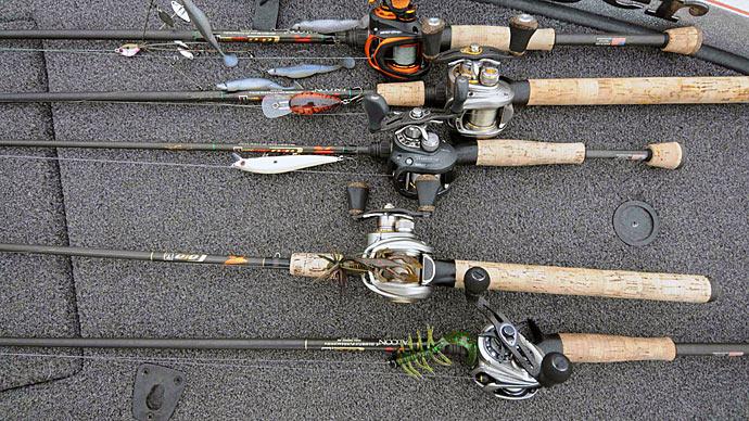 Well used fishing rods and reels ready to use on a party fishing